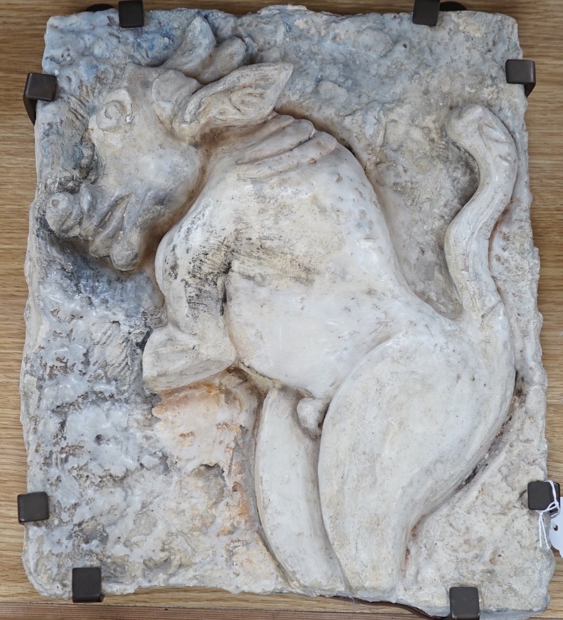 Ruth Sulke - a studio pottery wax and plaster relief plaque of a rearing bull, on wooden base, 31cms wide x 38cms high